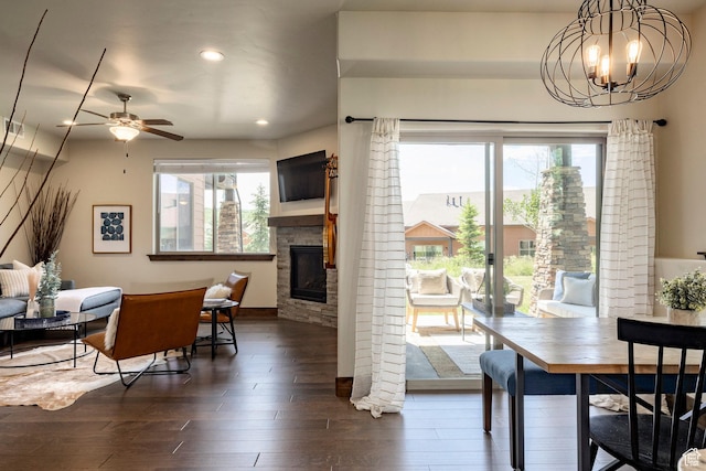 1261 W Black Rock Trl Unit 39D, Kamas, UT 84036 - dining room featuring a fireplace, dark wood-style flooring, ceiling fan, recessed lighting, and a chandelier