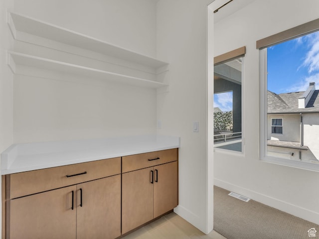 11609 S Dorian Dr W, South Jordan, UT 84009 - bar with light colored carpet and baseboards