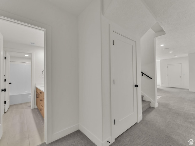11609 S Dorian Dr W, South Jordan, UT 84009 - corridor featuring recessed lighting, light colored carpet, and stairway