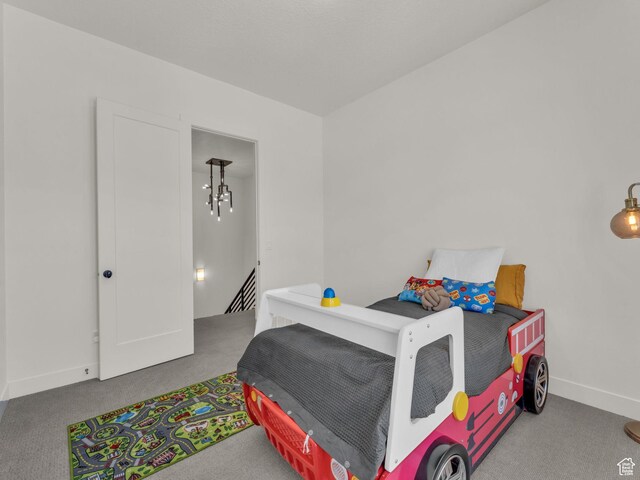11609 S Dorian Dr W, South Jordan, UT 84009 - carpeted bedroom featuring baseboards