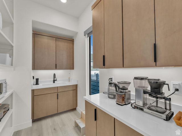 11609 S Dorian Dr W, South Jordan, UT 84009 - kitchen featuring light countertops and light wood-style flooring