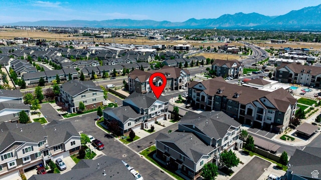 5382 W Tioga Pl, Herriman, UT 84096 - aerial view of property's location featuring a mountain backdrop and nearby suburban area