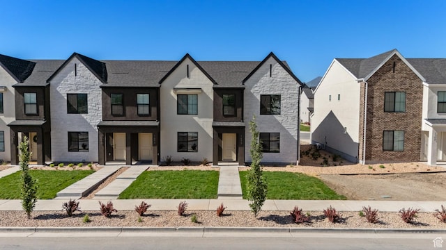 1557 E 720 N Unit 1070, Salem, UT 84653 - view of front facade featuring stone siding and a front yard