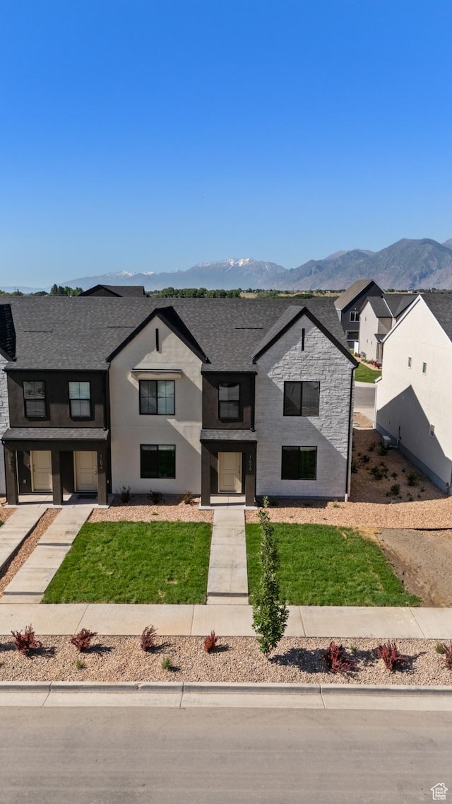 1557 E 720 N Unit 1070, Salem, UT 84653 - view of front of home featuring a mountain view, roof with shingles, and a front lawn