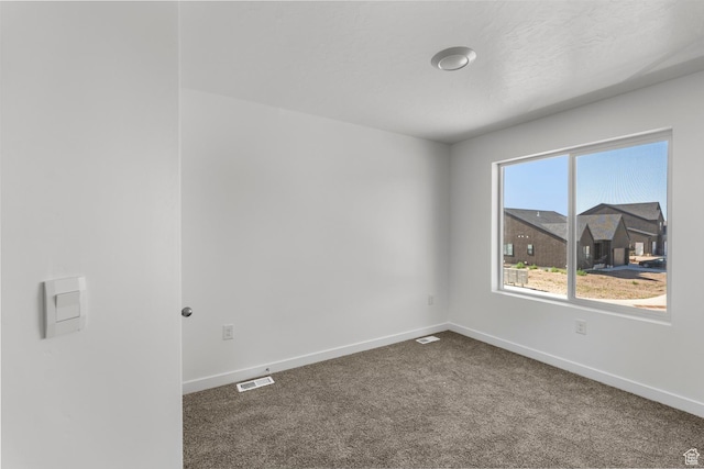 1557 E 720 N Unit 1070, Salem, UT 84653 - spare room with baseboards and dark carpet