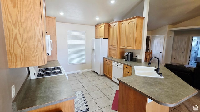 65 E 300 S, Salina, UT 84654 - kitchen featuring white appliances, a peninsula, light tile patterned flooring, recessed lighting, and a breakfast bar