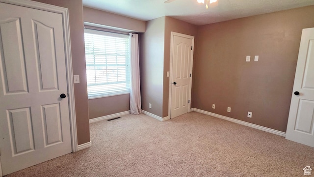 65 E 300 S, Salina, UT 84654 - unfurnished bedroom with light colored carpet and a ceiling fan