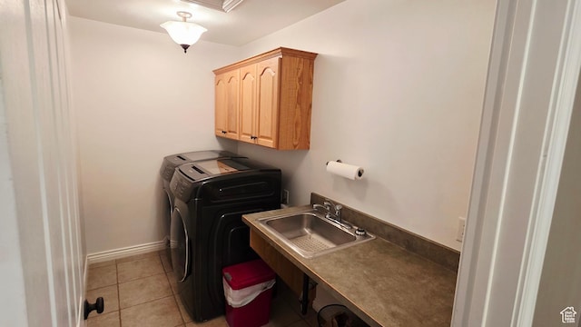 65 E 300 S, Salina, UT 84654 - washroom featuring independent washer and dryer, cabinet space, and light tile patterned floors