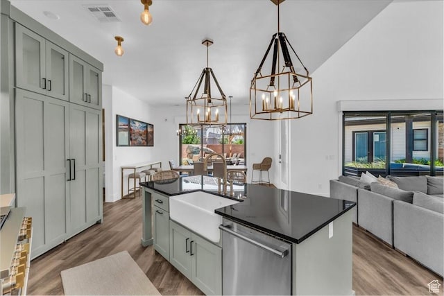 772 E Prairie Way, Washington, UT 84780 - kitchen featuring dishwasher, a chandelier, dark countertops, dark wood finished floors, and open floor plan