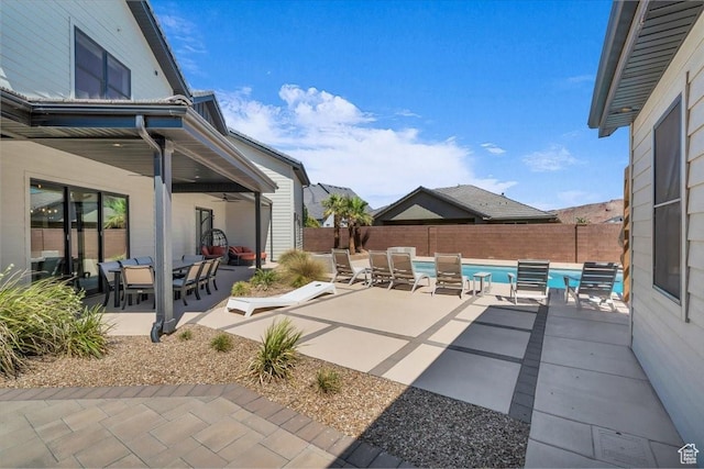 772 E Prairie Way, Washington, UT 84780 - fenced backyard with outdoor dining space, ceiling fan, and a patio area