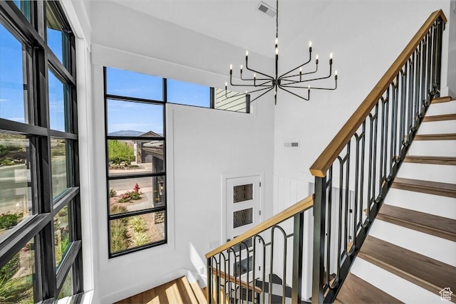 772 E Prairie Way, Washington, UT 84780 - stairs with a chandelier and wood finished floors