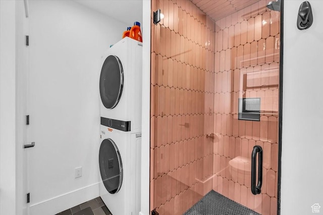 772 E Prairie Way, Washington, UT 84780 - laundry area featuring stacked washer and clothes dryer and tile patterned floors