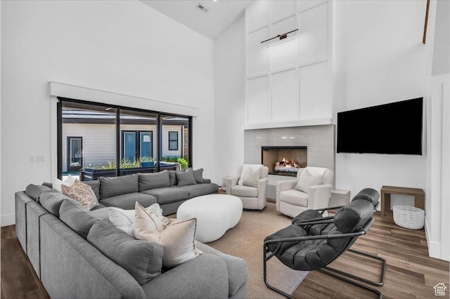 772 E Prairie Way, Washington, UT 84780 - living room with high vaulted ceiling, wood finished floors, and a fireplace
