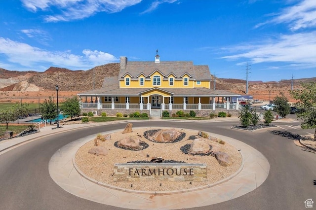 772 E Prairie Way, Washington, UT 84780 - view of building exterior with curved driveway and a mountain view