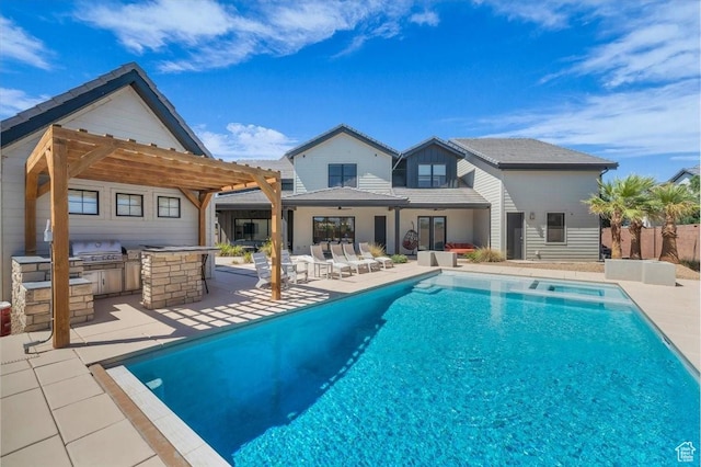 772 E Prairie Way, Washington, UT 84780 - rear view of property featuring exterior kitchen, a pergola, a patio, ceiling fan, and a pool with connected hot tub