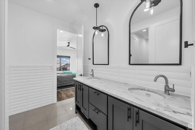 772 E Prairie Way, Washington, UT 84780 - ensuite bathroom with double vanity, ceiling fan, and tile patterned flooring