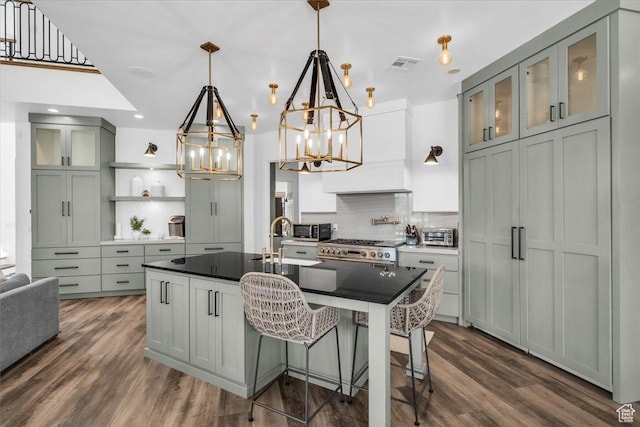 772 E Prairie Way, Washington, UT 84780 - kitchen with a chandelier, decorative backsplash, dark wood-style floors, dark countertops, and recessed lighting