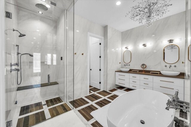 772 E Prairie Way, Washington, UT 84780 - full bathroom featuring a stall shower, double vanity, a soaking tub, and recessed lighting