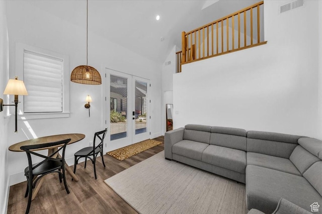 772 E Prairie Way, Washington, UT 84780 - living area featuring french doors, wood finished floors, high vaulted ceiling, and recessed lighting