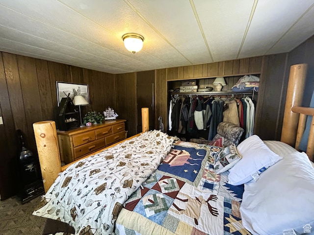 5223 N 930 E, Scofield, UT 84526 - bedroom featuring a closet, wooden walls, and carpet