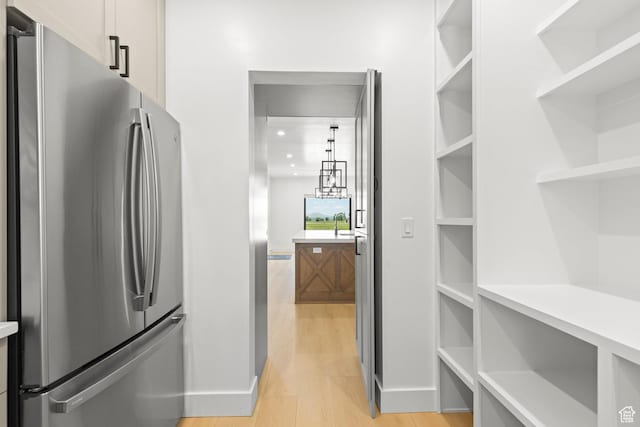 3359 W 3500 S, Wellsville, UT 84339 - spacious closet with light wood-style floors