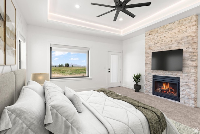 3359 W 3500 S, Wellsville, UT 84339 - bedroom featuring carpet floors, a fireplace, recessed lighting, a ceiling fan, and a tray ceiling