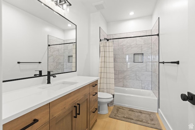 3359 W 3500 S, Wellsville, UT 84339 - full bathroom featuring vanity, shower / tub combo with curtain, recessed lighting, and wood finished floors