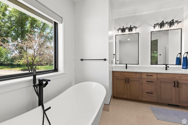 3359 W 3500 S, Wellsville, UT 84339 - bathroom featuring double vanity and a freestanding bath