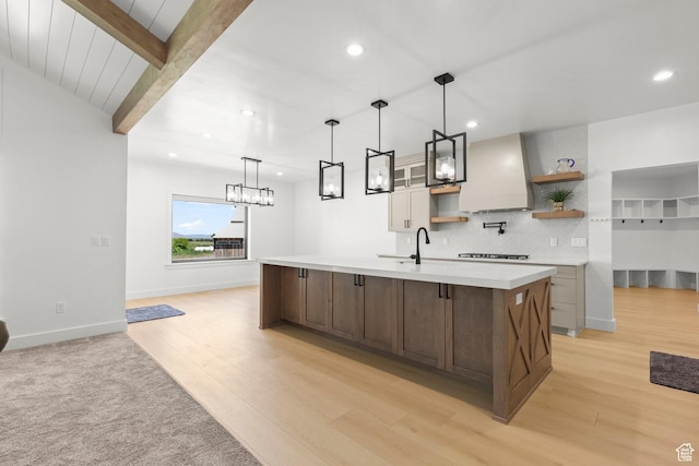 3359 W 3500 S, Wellsville, UT 84339 - bar area featuring premium range hood, light wood-style flooring, recessed lighting, backsplash, and cooktop