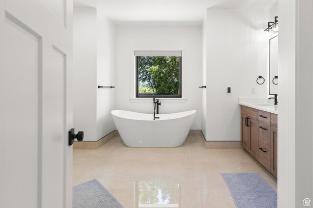 3359 W 3500 S, Wellsville, UT 84339 - bathroom with double vanity and a soaking tub