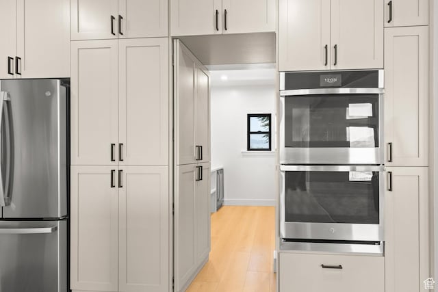 3359 W 3500 S, Wellsville, UT 84339 - kitchen featuring appliances with stainless steel finishes and light wood-style flooring