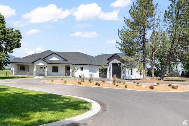 3359 W 3500 S, Wellsville, UT 84339 - modern inspired farmhouse with a front yard and stone siding