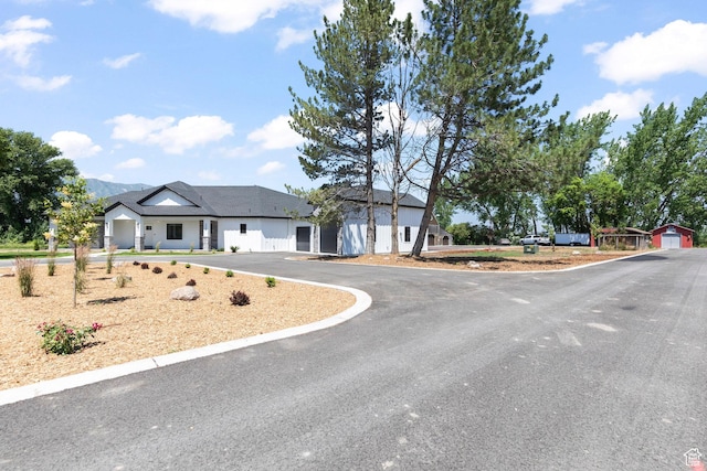 3359 W 3500 S, Wellsville, UT 84339 - view of front of property featuring driveway and an attached garage