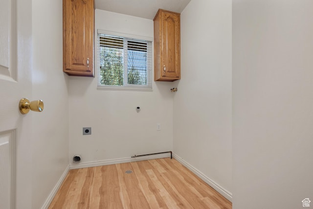 560 S 1350 E, Fruit Heights, UT 84037 - laundry area featuring hookup for an electric dryer, cabinet space, light wood-style floors, and gas dryer hookup