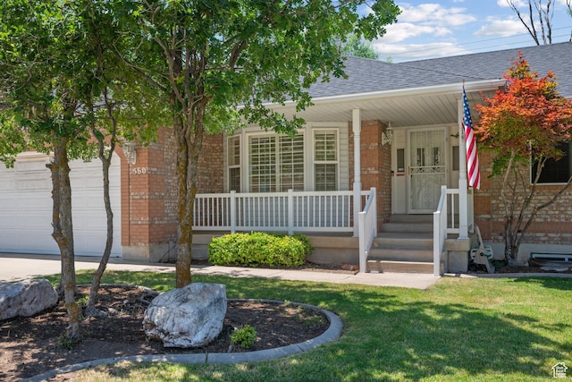 560 S 1350 E, Fruit Heights, UT 84037 - view of front of home with a porch, brick siding, roof with shingles, and a front lawn
