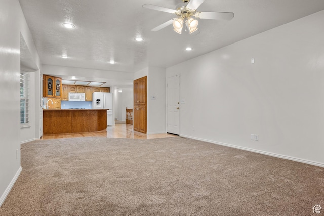 560 S 1350 E, Fruit Heights, UT 84037 - unfurnished living room featuring light carpet, recessed lighting, and ceiling fan