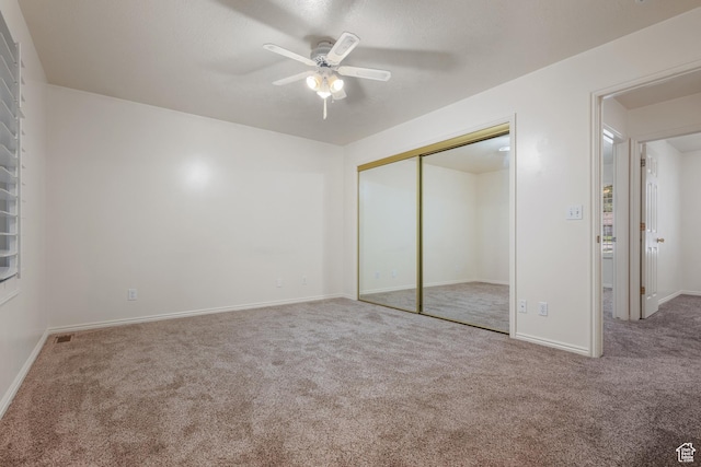 560 S 1350 E, Fruit Heights, UT 84037 - unfurnished bedroom featuring carpet flooring, a closet, and ceiling fan