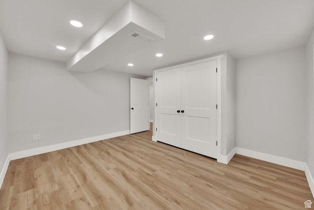 10852 S Starpine Dr, Sandy, UT 84094 - finished basement with light wood-style flooring and recessed lighting
