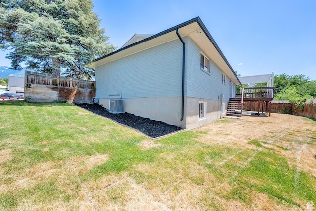 10852 S Starpine Dr, Sandy, UT 84094 - view of property exterior with stairway, a wooden deck, and brick siding