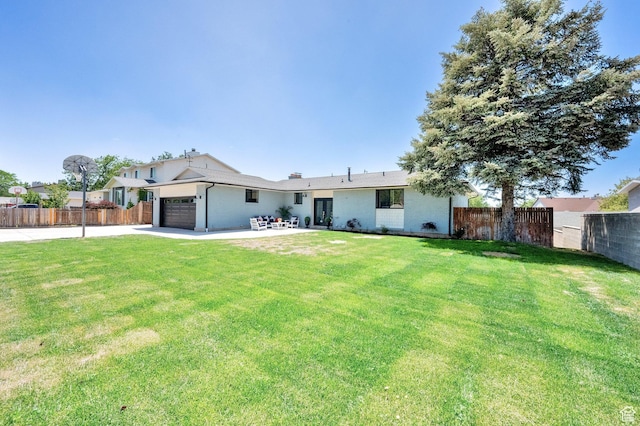 10852 S Starpine Dr, Sandy, UT 84094 - back of property with an attached garage and driveway