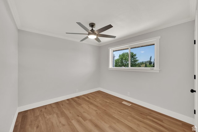 10852 S Starpine Dr, Sandy, UT 84094 - unfurnished room with crown molding, a ceiling fan, and light wood-type flooring