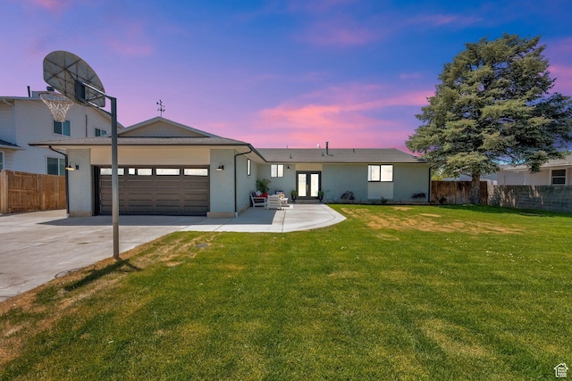 10852 S Starpine Dr, Sandy, UT 84094 - view of front of property featuring french doors, driveway, a garage, and brick siding