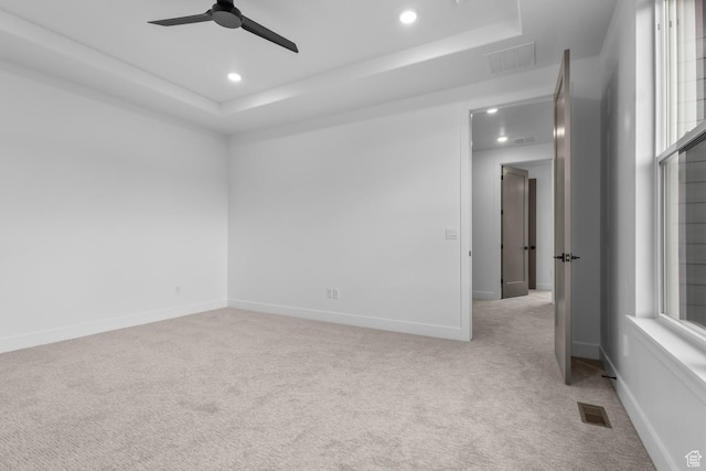 4269 N Maple Hollow Dr Unit 117, Lehi, UT 84043 - unfurnished room featuring a tray ceiling, light colored carpet, recessed lighting, and a ceiling fan