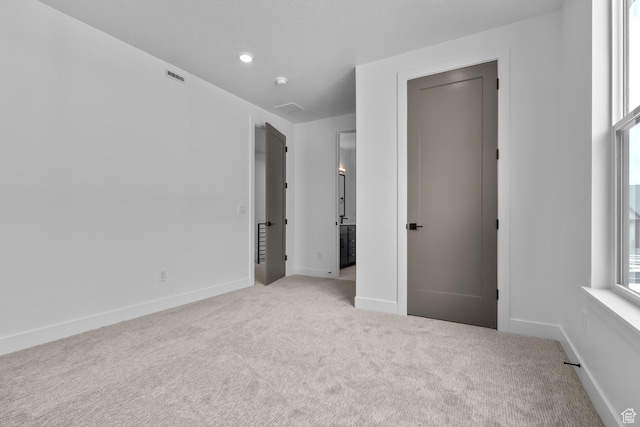 4269 N Maple Hollow Dr Unit 117, Lehi, UT 84043 - unfurnished bedroom featuring light colored carpet and baseboards