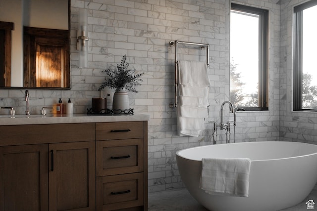 9156 E Forest Rd Unit 24, Heber City, UT 84032 - bathroom with vanity, a soaking tub, and tile walls