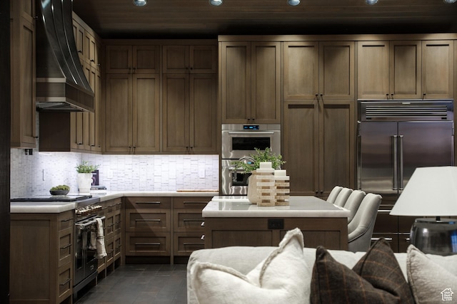 9156 E Forest Rd Unit 24, Heber City, UT 84032 - kitchen featuring high quality appliances, wall chimney range hood, recessed lighting, light countertops, and wooden ceiling