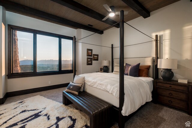 9156 E Forest Rd Unit 24, Heber City, UT 84032 - bedroom with carpet floors and a wooden ceiling with exposed beams