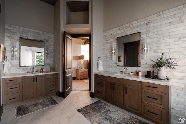 9156 E Forest Rd Unit 24, Heber City, UT 84032 - bathroom featuring backsplash and two vanities