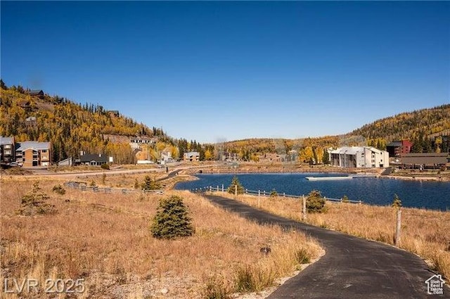 223 Hunter Ridge Rd Unit E121, Brian Head, UT 84719 - water view with a mountain backdrop