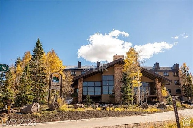 223 Hunter Ridge Rd Unit E121, Brian Head, UT 84719 - obstructed view of property featuring stucco siding
